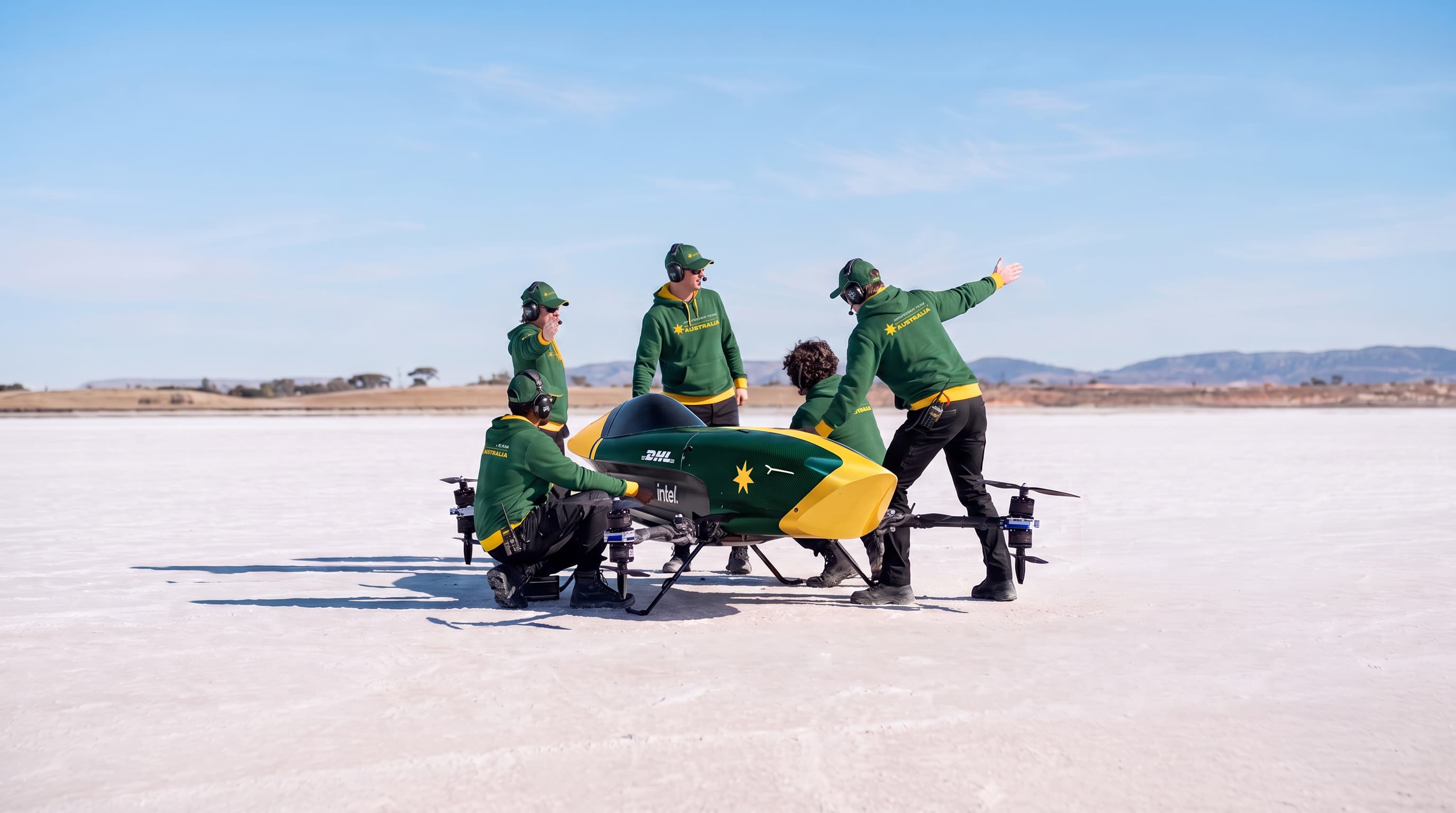 Airspeeder Team Australia crew with the aircraft on the salt flats.